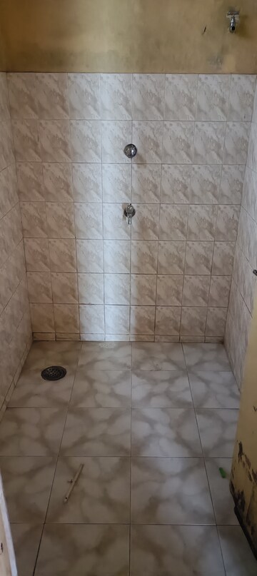 Bathroom in 2 BHK Apartment at Swapnapurti CHS Pune, Nigdi – for Sale
