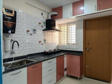 Kitchen in 2 BHK Apartment at Morya CHS Chikhali, Chikhali – for Sale