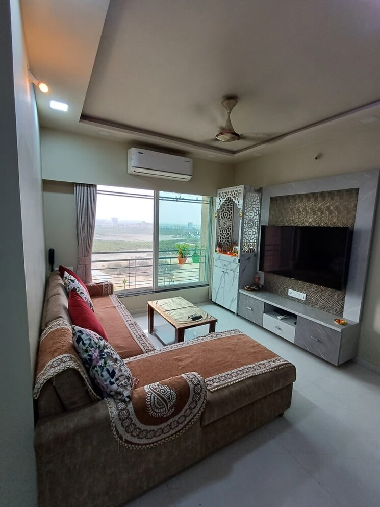 Living Room, gurukrupa-marina-enclave-wings-m-n-phase-ii 2 Bedroom 741 Sq.Ft. Apartment In Jankalyan Nagar Mumbai 7033734