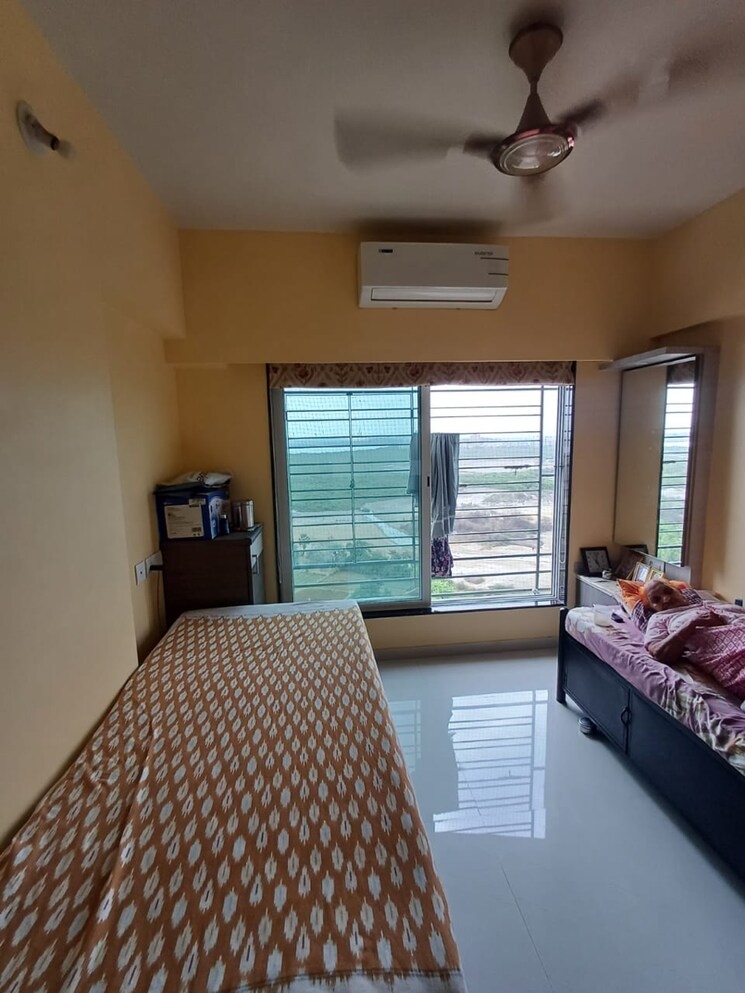 Bedroom, gurukrupa-marina-enclave-wings-m-n-phase-ii 2 Bedroom 741 Sq.Ft. Apartment In Jankalyan Nagar Mumbai 7033734