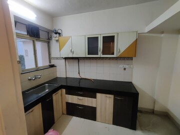 Kitchen in 3 BHK Apartment at Mahindra Gardens, Goregaon West – for Rent