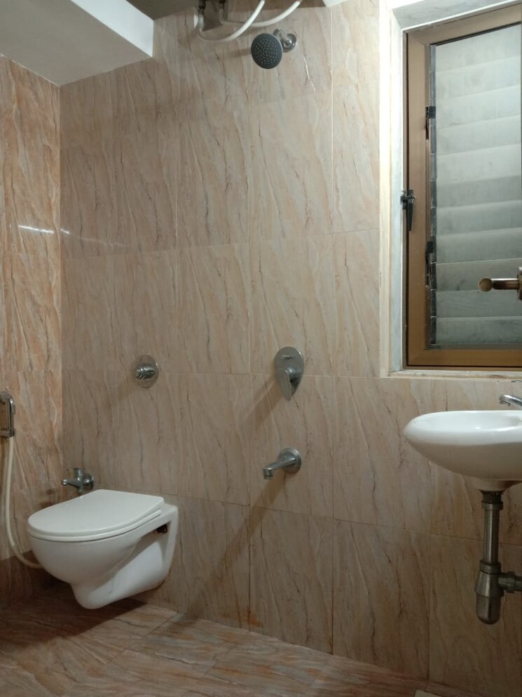 Bathroom, infini-om-sai-home 1 Bedroom 479 Sq.Ft. Apartment In Themghar Thane 7035516