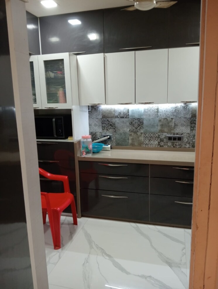 Kitchen, lokhandwala 3 Bedroom 1100 Sq.Ft. Apartment In Lokhandwala Mumbai 7036215