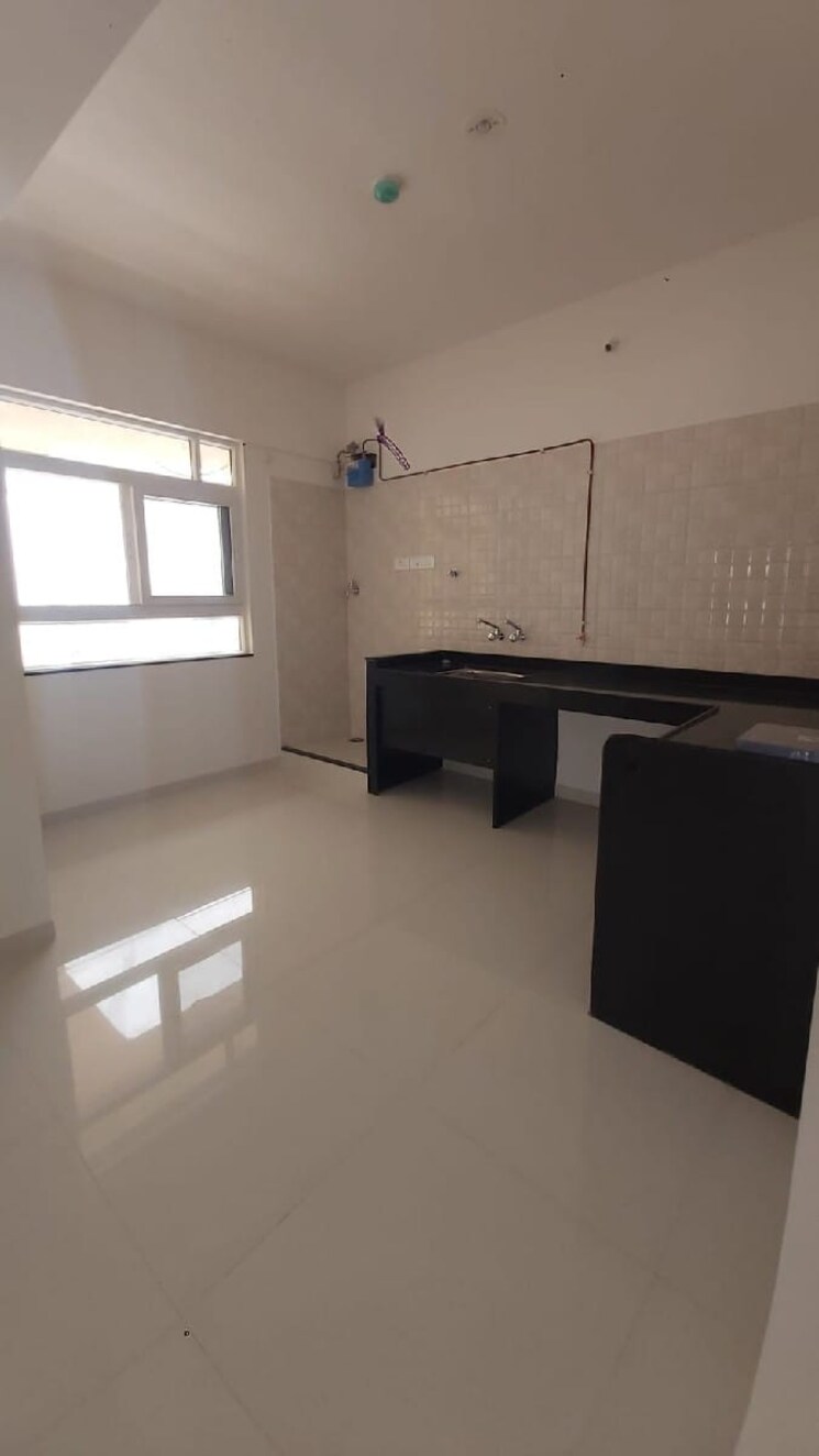 Kitchen, nyati-elysia 2 Bedroom 720 Sq.Ft. Apartment In Kharadi Pune 7040306