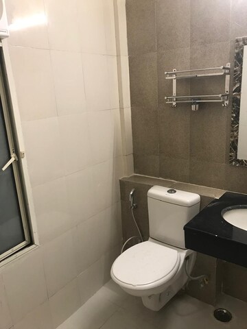 Bathroom in 3.5 BHK Independent House at HIG Flats, Sector 99 – for Sale