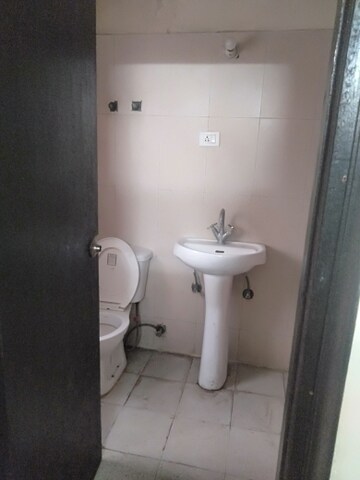 Bathroom in 3.5 BHK Apartment at Aims Golf City, Sector 75 – for Sale