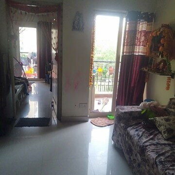 Living Room in 3.5 BHK Apartment at Aims Golf City, Sector 75 – for Sale