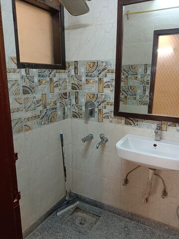 Bathroom in 2 BHK Apartment at Lajpat Nagar – for Rent