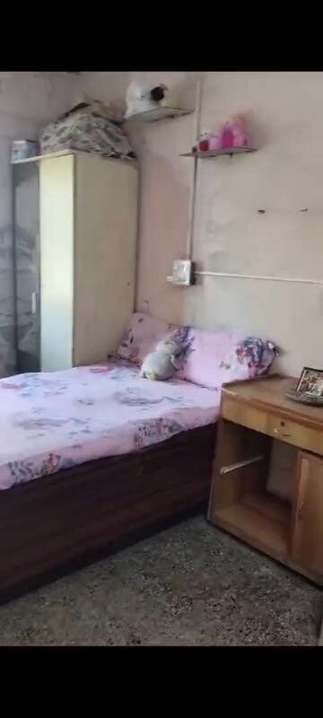 Bedroom in 2 BHK Apartment at Bhavik CHSL, Dombivli West – for Sale