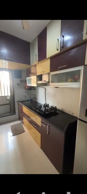 Kitchen in 3 BHK Apartment at Unique Shanti Skyline 2, Mira Road – for Sale