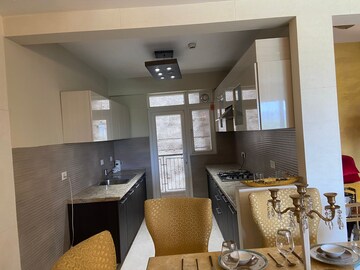 Kitchen in 6 BHK Apartment at Real Anchor World Residency, Indrapuram – for Sale