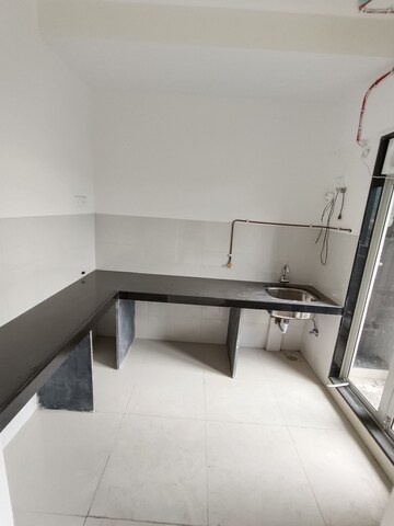 Kitchen in 1 BHK Apartment at Ashar Metro Towers, Vartak Nagar – for Sale