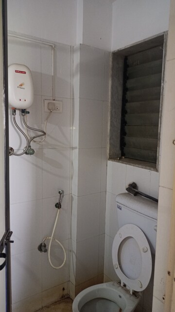 Bathroom in 1 BHK Apartment at Unnathi Woods Phase 3, Ghodbunder Road – for Sale