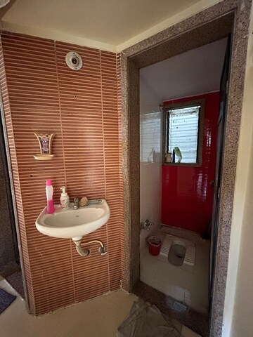 Bathroom in 2 BHK Apartment at Mangeshi Sahara, Chikan Ghar – for Sale