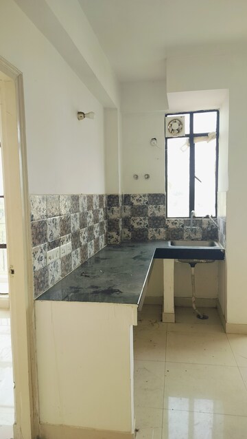 Kitchen in 1 BHK Apartment at Signature Global Synera, Sector 81 – for Sale