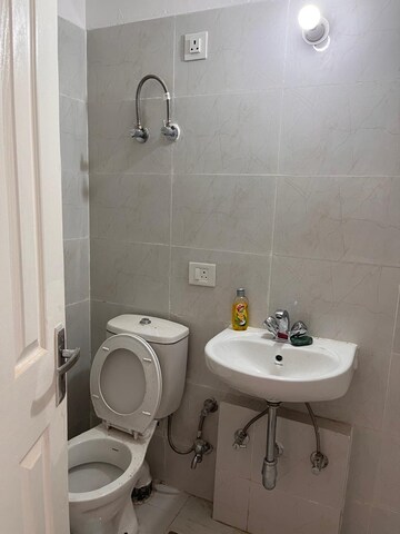 Bathroom in 3 BHK Apartment at Adore Happy Homes Grand, Sector 85 – for Sale