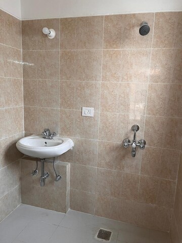 Bathroom in 3 BHK Apartment at Adore Happy Homes Grand, Sector 85 – for Sale
