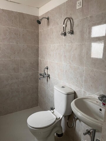 Bathroom in 3 BHK Apartment at Adore Happy Homes Grand, Sector 85 – for Sale