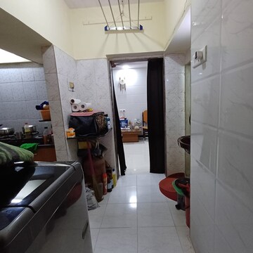 Kitchen in 1 BHK Apartment at Kharigaon – for Sale