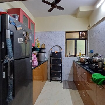 Kitchen in 1 BHK Apartment at Kharigaon – for Sale