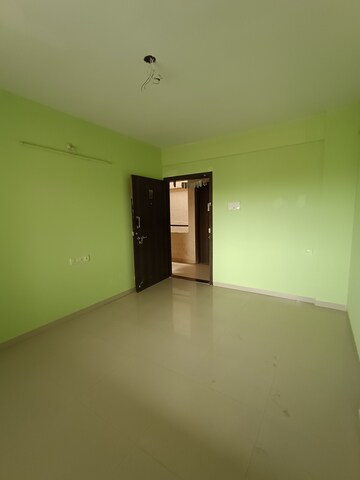 Living Room in 1 BHK Apartment at Maple Aapla Ghar Kirkatwadi, Shetphal Haveli – for Sale