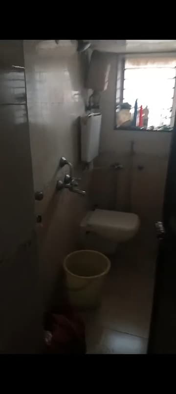 Bathroom in 2 BHK Apartment at Pushpak CHS Dhaisar East, Dahisar East – for Sale