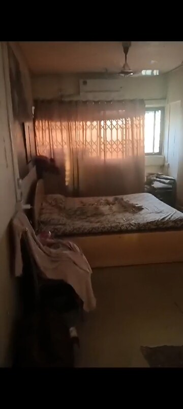 Bedroom in 2 BHK Apartment at Pushpak CHS Dhaisar East, Dahisar East – for Sale