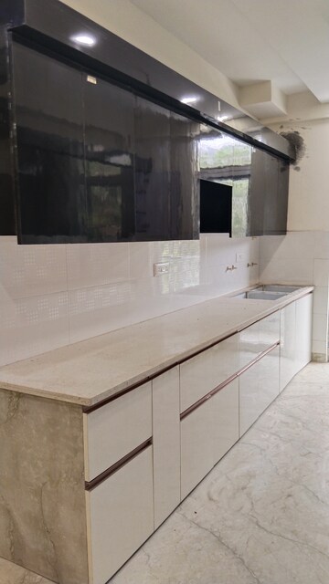 Kitchen in 4 BHK Builder Floor at SG Alpha Tower, Vasundhara Sector 9 – for Sale
