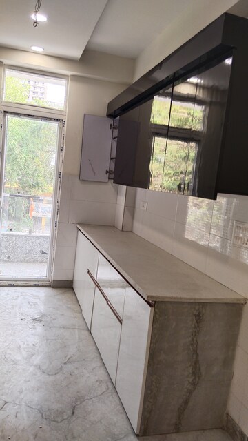 Kitchen in 4 BHK Builder Floor at SG Alpha Tower, Vasundhara Sector 9 – for Sale