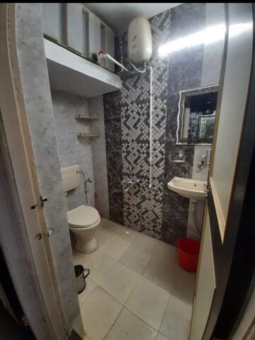 Bathroom in 2 BHK Apartment at Bramha Aangan, Salunkhe Vihar Society – for Sale