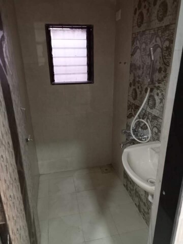 Bathroom in 1 BHK Apartment at Frenny Platinum Tower, Vasai East – for Sale