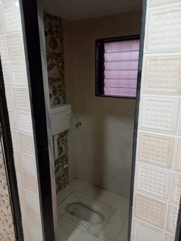 Bathroom in 1 BHK Apartment at Frenny Platinum Tower, Vasai East – for Sale