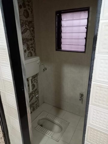 Bathroom in 1 BHK Apartment at Frenny Platinum Tower, Vasai East – for Sale