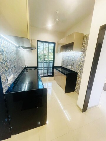 Kitchen in 2 BHK Apartment at Wonder Park, Vasai East – for Sale