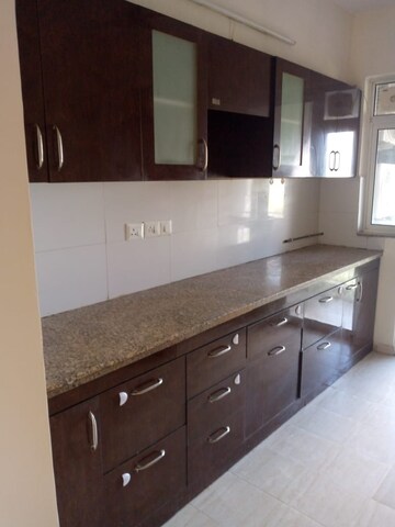 Kitchen in 3 BHK Apartment at DLF Regal Gardens, Sector 90 – for Sale