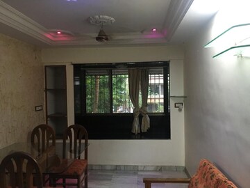 Living Room in 1 BHK Apartment at Pleasant CHS Malad, Malad West – for Sale