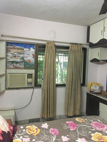 Living Room in 1 BHK Apartment at Pleasant CHS Malad, Malad West – for Sale