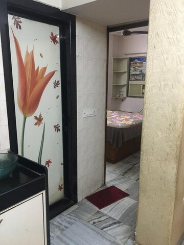 Living Room in 1 BHK Apartment at Pleasant CHS Malad, Malad West – for Sale