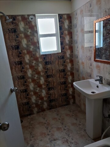 Kitchen in 2.5 BHK Apartment at Amrapali Zodiac, Sector 120 – for Sale
