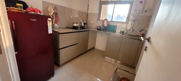 Kitchen in 1 BHK Apartment at Hiranandani Estate Solitaire C, Ghodbunder Road – for Sale