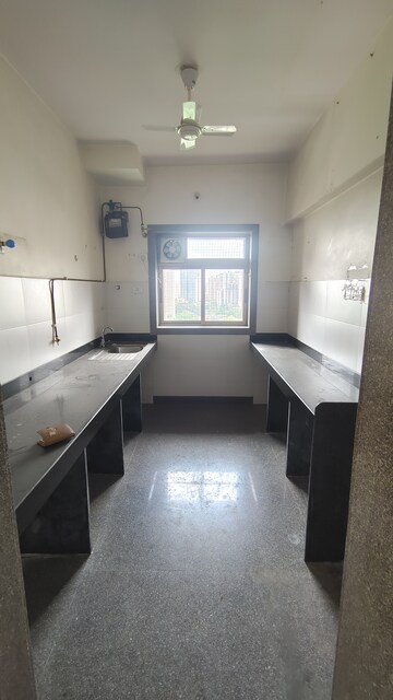 Kitchen in 2 BHK Apartment at Siddhachal Phase 8 Building No. 4 Chs Ltd, Manpada – for Sale
