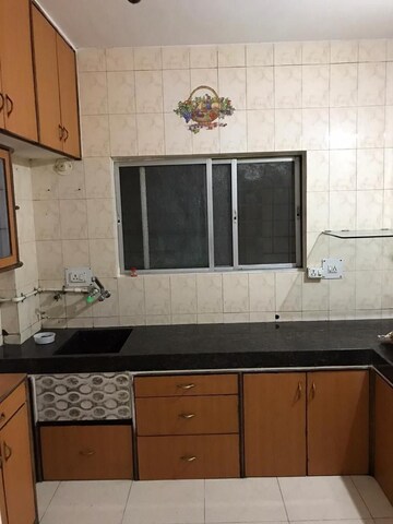 Kitchen in 2 BHK Apartment at Kumar Urban Kubera Colony, Kondhwa – for Rent