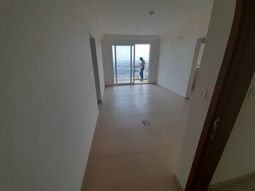 Building Lobby in 2 BHK Apartment at Bhartiya Nikoo Homes Phase 2, Thanisandra Main Road – for Sale