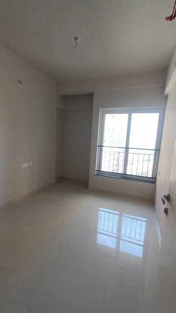 Room in 2 BHK Apartment at Rustomjee Azziano Wing D, Majiwada – for Sale
