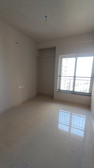 Room in 2 BHK Apartment at Rustomjee Azziano Wing D, Majiwada – for Sale