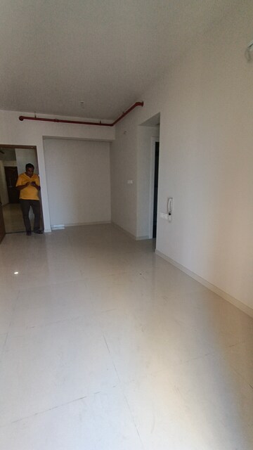Room in 2 BHK Apartment at Rustomjee Azziano Wing D, Majiwada – for Sale