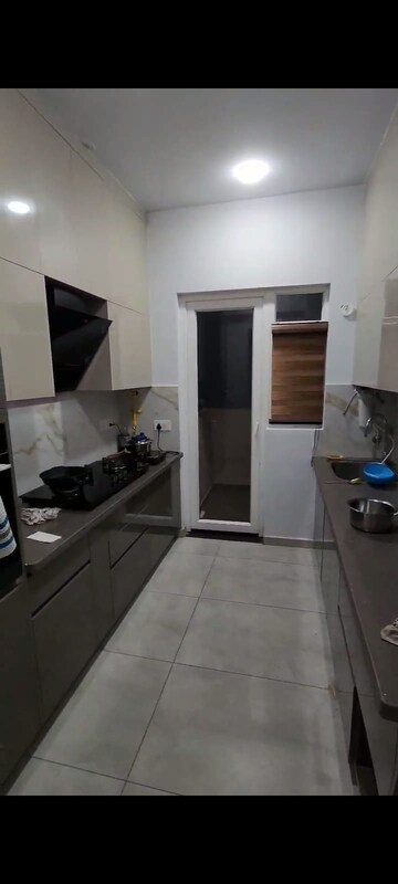 Kitchen in 4 BHK Apartment at Great Value Sharanam, Sector 107 – for Sale