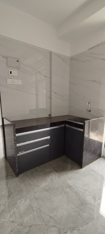 Kitchen in 1 BHK Apartment at Shree Zalawad Nagar CHS, Nalasopara East – for Sale