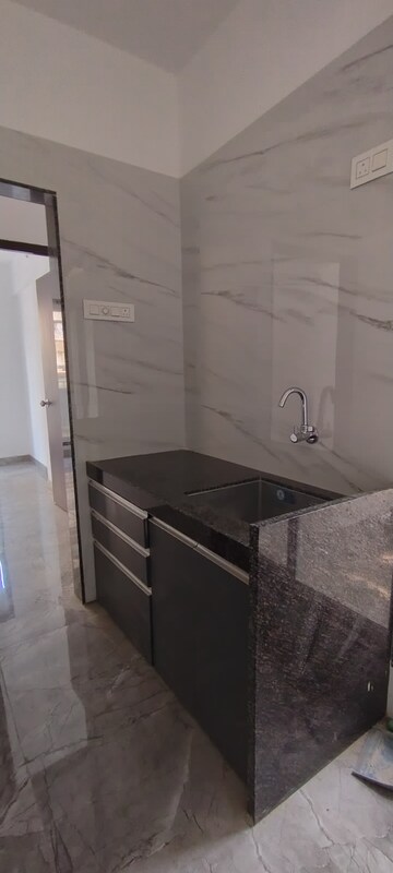 Kitchen in 2 BHK Apartment at Shree Zalawad Nagar CHS, Nalasopara East – for Sale