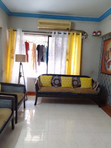 Bedroom in 2 BHK Apartment at Divya Srushti CHS, Kandivali West – for Rent